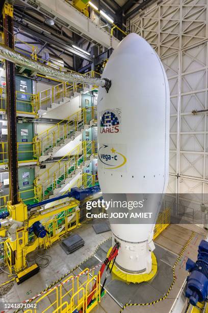 This photograph taken on July 12, 2022 shows the Vega-C assembled to the launcher's nose cone with a metal sphere, LARES-2, to study gravitational...