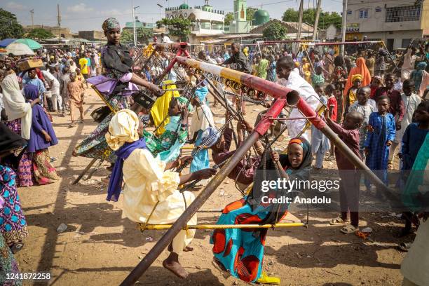 Children enjoy at a park in Kano, located in northern Nigeria and the capital of Kano State, Nigeria on July 11, 2022.