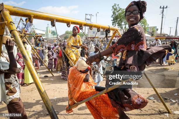 Children enjoy at a park in Kano, located in northern Nigeria and the capital of Kano State, Nigeria on July 11, 2022.