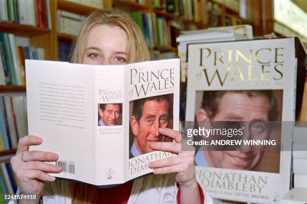 Caroline Norman of Foyles bookshop takes a look at Jonathan Dimbleby's highly publicised biography of Prince Charles, in London on November 1, 1994....
