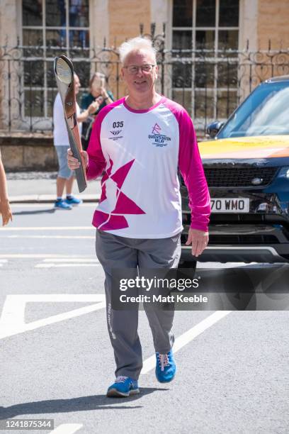 Peter Nadin takes part in The Queen's Baton Relay as it visits Malton as part of the Birmingham 2022 Queens Baton Relay on July 13, 2022 in Malton,...