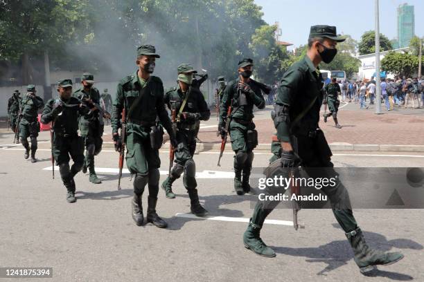 Sri Lanka Army personnel move in to disperse protestors near the Prime Ministerâs office at Flower Road in Colombo, Sri Lanka, on July 13, 2022....