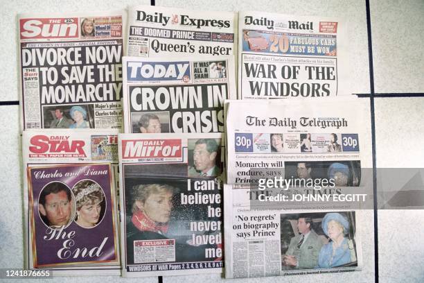Picture taken on October 17, 1994 at london showing the headlines of the national morning newspapers published the day after the Sunday Times...