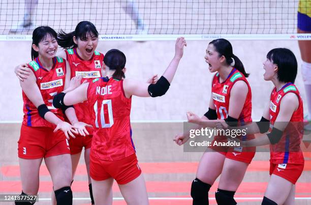 Players of Japan celebrate after a score during FIVB Women's Volleyball Nations League Final Phase quarterfinal match between Brazil and Japan at...