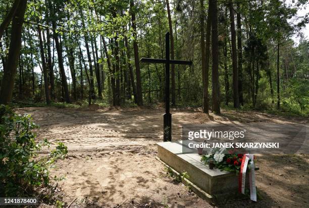 Symbolic grave in the Bialucki Forest near Ilowo on July 13, 2022 the site where the mass grave of about 8,000 Geman Nazi victims from the nearby...