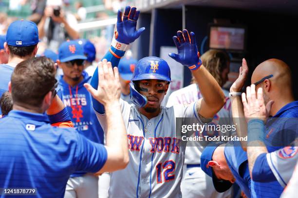 Francisco Lindor of the New York Mets reacts with teammates after his three run home run during the third inning against the Atlanta Braves at Truist...