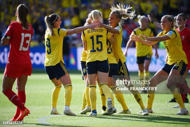 Sweden's players celebrate their second goal scored by midfielder Hanna Bennison during the UEFA Women's Euro 2022 Group C football match between...
