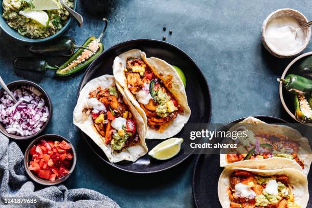 delicious vegan tacos served in a plate - mexican food stock pictures, royalty-free photos & images