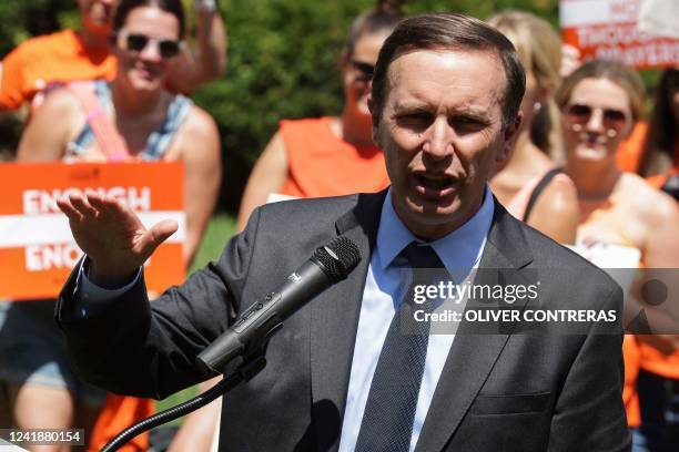 Senator Chris Murphy speaks as he joins Uvalde and Highland Park mass shootings survivors, families and supporters rally on Capitol Hill in...