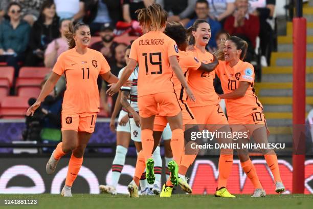 Netherlands' midfielder Damaris Egurrola celebrates scoring the opening goal during the UEFA Women's Euro 2022 Group C football match between...