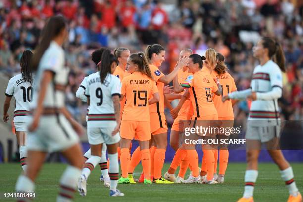 Netherlands' players celebrate the opening goal scored by midfielder Damaris Egurrola during the UEFA Women's Euro 2022 Group C football match...