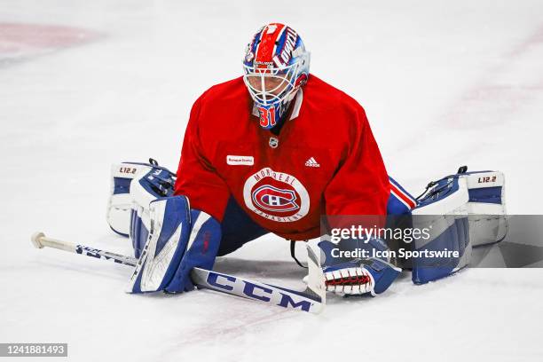 Montreal Canadiens goalie prospect Owen Savory stretches at center ice during the Montreal Canadiens Development Camp on July 12 at Bell Sports...