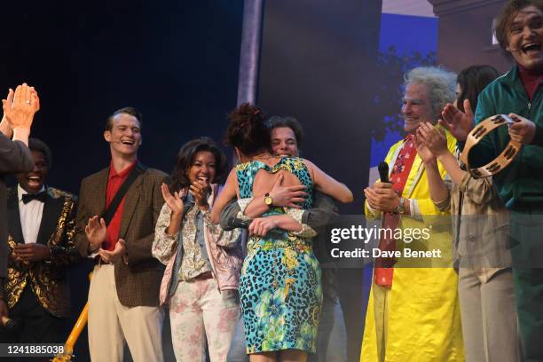 Original "Jennifer Parker" Claudia Wells hugs "Marty McFly" cast member Will Haswell onstage at the West End production of "Back To The Future: The...