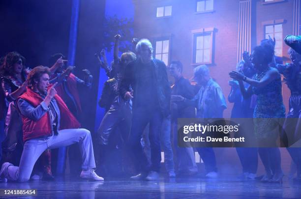 Original "Doc Brown" Christopher Lloyd poses onstage at the West End production of "Back To The Future: The Musical" at The Adelphi Theatre on July...