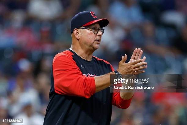 Manager Terry Francona of the Cleveland Guardians walks to the mound to make a pitching change against the Chicago White Sox during the seventh...