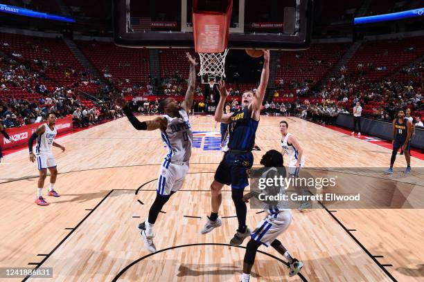 Jack White of the Denver Nuggets drives to the basket during the game against the LA Clippers during the 2022 Las Vegas Summer League on July 13,...