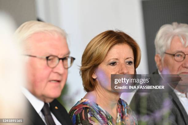 German President Frank-Walter Steinmeier and Rhineland-Palatinate's State Premier Malu Dreyer are pictured during a visit at the rebuilt wine tavern...