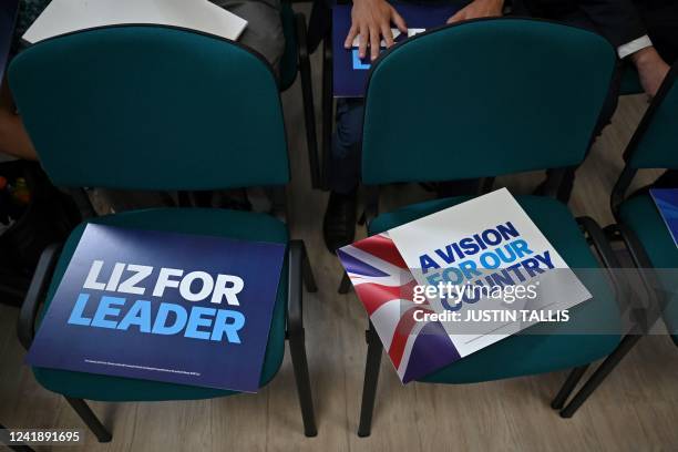 Campaign placards are seen on chairs at the campaign launch event of Britain's Foreign Secretary Liz Truss to become the next leader of the...