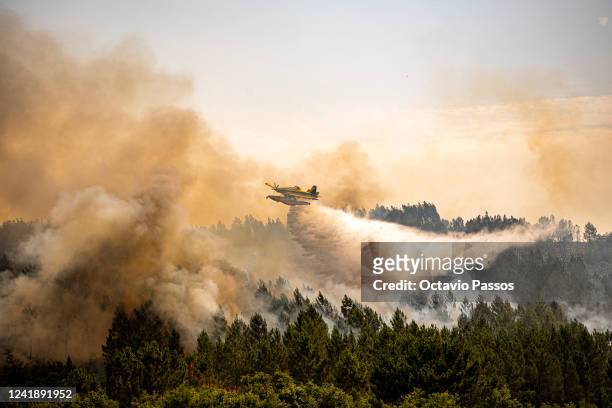 An Air Tractor AT-802F "Fire Boss" airplane takes part in firefighting operations at Gesteira de Baixo on July 14, 2022 in Pombal, Portugal....