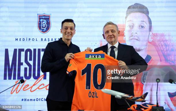 Year-old midfielder Mesut Ozil attends a contract signing ceremony with Medipol Basaksehir at Basaksenir Fatih Terim Stadium on July 14, 2022 in...