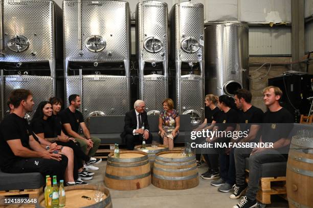 German President Frank-Walter Steinmeier and Rhineland-Palatinate's State Premier Malu Dreyer sit with the staff in the cellar during their visit to...