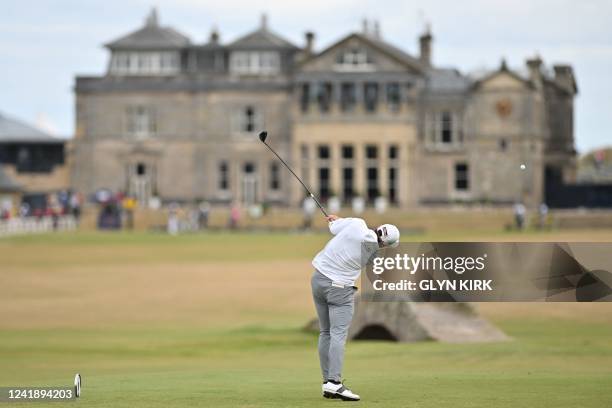 Golfer Cameron Young plays from the 18th tee during his opening round 64 on the first day of The 150th British Open Golf Championship on The Old...