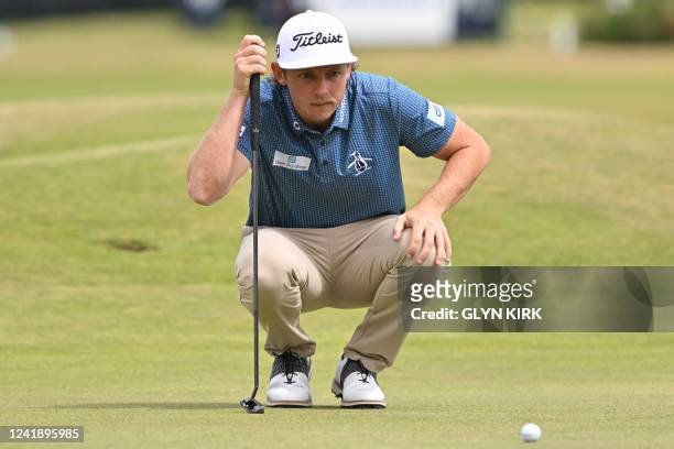 Australia's Cameron Smith lines up a putt on the 17th green during his opening round 67 on the first day of The 150th British Open Golf Championship...