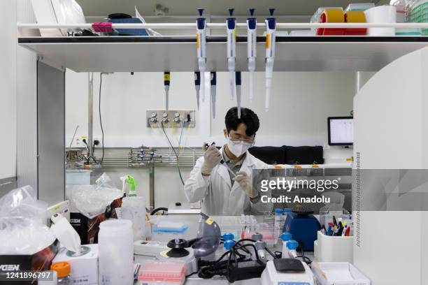 An employee works at a laboratory developing SKYCovione Covid-19 vaccine in the SK Bioscience Co R&amp;D Center in Seongnam, South Korea, on...