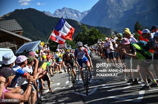 Groupama-FDJ team's French rider David Gaudu cycles in the ascent of Alpe d'Huez during the 12th stage of the 109th edition of the Tour de France...