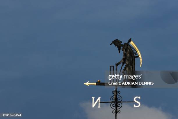 The weathervane Father Time, in the shape of Father Time removing the bails from a wicket, is pictured during the Second Royal London One Day...