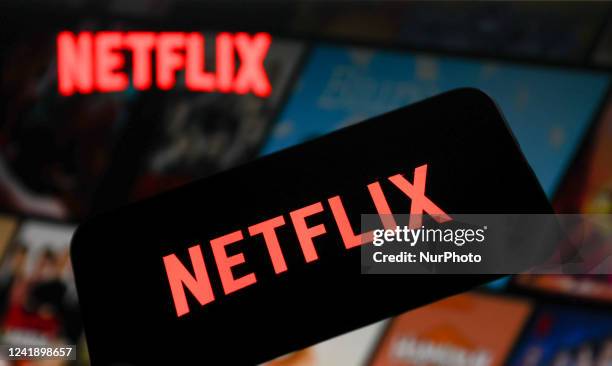 Netflix logo displayed on a phone screen and Netflix website displayed on a laptop screen are seen in this illustration photo taken in Krakow, Poland...