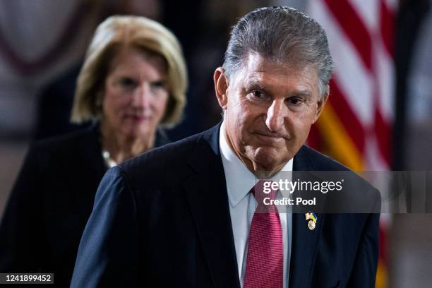 Sen. Joe Manchin, D-W.Va., and Sen. Shelley Moore Capito, R-W.Va., pay respects to Hershel Woodrow Woody Williams in the United States Capitol...