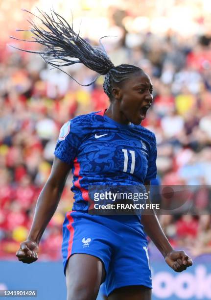 France's striker Kadidiatou Diani celebrates after scoring her team first goal during the UEFA Women's Euro 2022 Group D football match between...