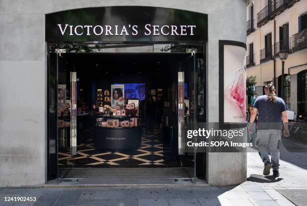 Pedestrian walks past the American lingerie, womenswear, and beauty products brand, Victoria's Secret store in Spain.