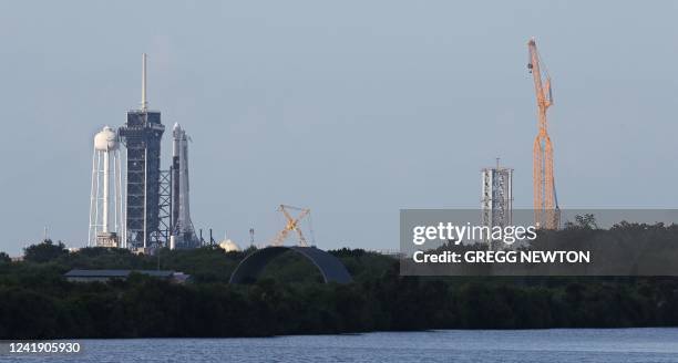 SpaceX Falcon 9 rocket sits at launch pad LC-39A as refurbishments are made to one of their facilities at the Kennedy Space Center in Florida on July...