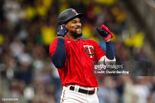 Byron Buxton of the Minnesota Twins celebrates his triple against the Chicago White Sox in the third inning at Target Field on July 14, 2022 in...