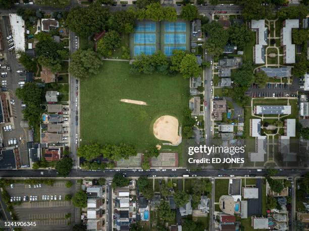 General view shows the Staten Island cricket club during a matchon June 11, 2022. - Cricket is barely played in the United States, but in New York...