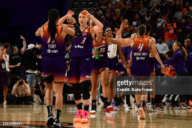 Phoenix Mercury high five during the game against the Washington Mystics on July 14, 2022 at Footprint Center in Phoenix, Arizona. NOTE TO USER: User...
