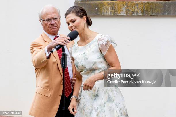 King Carl Gustaf of Sweden and Crown Princess Victoria of Sweden in the garden of the family summer palace Solliden on Oland island on the occasion...