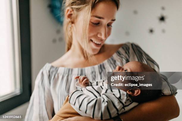 mom's boy - kissing feet stock pictures, royalty-free photos & images