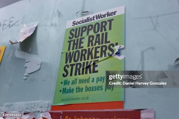 Poster from Socialist Worker campaigns for support in favour of ongoing rail workers' strikes up and down the country as the National Union of Rail,...