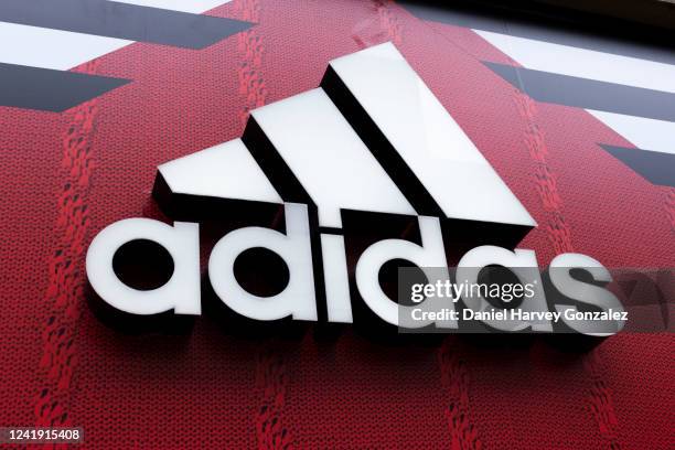 The logo branding for Adidas AG, known as Adidas, a German multinational corporation that designs and manufactures sportswear and fashion items on...