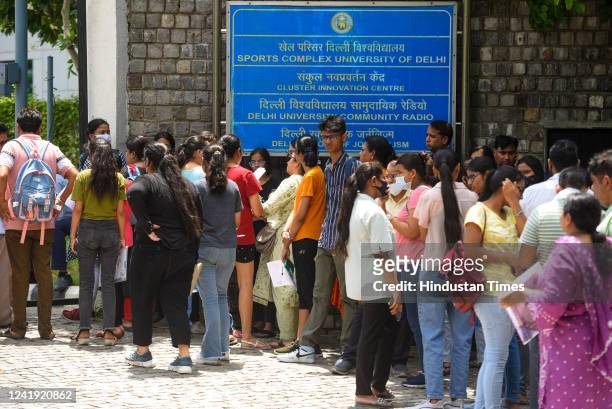Common University Entrance Test-Undergraduate aspirants seen outside the exam centre, at North campus, on July 15, 2022 in New Delhi, India. The...