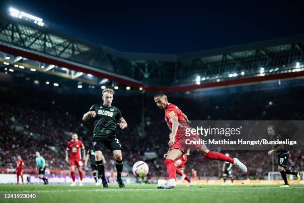 Jannik Dehm of Hannover in action against Kenny Prince Redondo of Kaiserslautern during the Second Bundesliga match between 1. FC Kaiserslautern and...