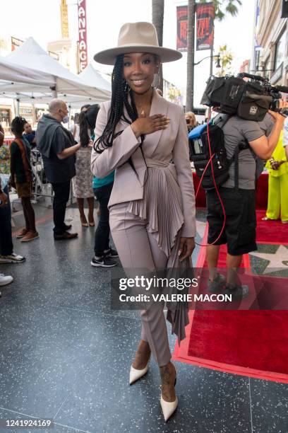 Singer Brandy Norwood attends the Hollywood Walk of Fame Star Ceremony for Jenifer Lewis at the Hollywood Walk of Fame on July 15, 2022 in Los...