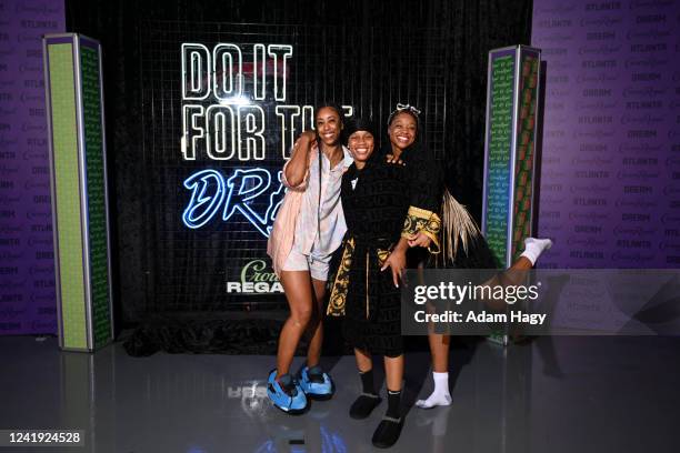 Kia Vaughn, Monique Billings, and AD Durr of the Atlanta Dream arrive at the arena before the game against the Connecticut Sun on July 15, 2022 at...