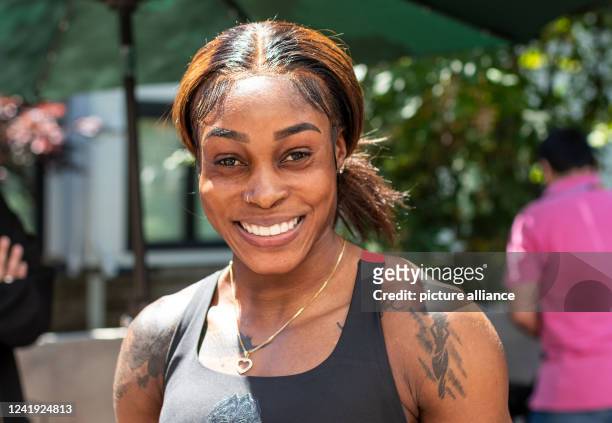 July 2022, US, Eugene: Athletics: World Championships: Olympic champion Elaine Thompson-Herah, sprinter from Jamaica, looks at the camera after a...