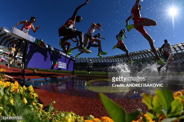 Japan's Kosei Yamaguchi competes in the men's 3000m steeplechase heats during the World Athletics Championships at Hayward Field in Eugene, Oregon on...
