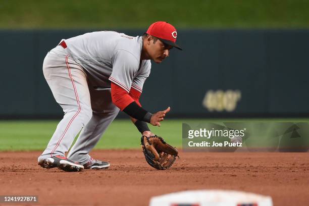 Donovan Solano of the Cincinnati Reds fields a ground ball by the St. Louis Cardinals in the fifth inning at Busch Stadium on July 15, 2022 in St...