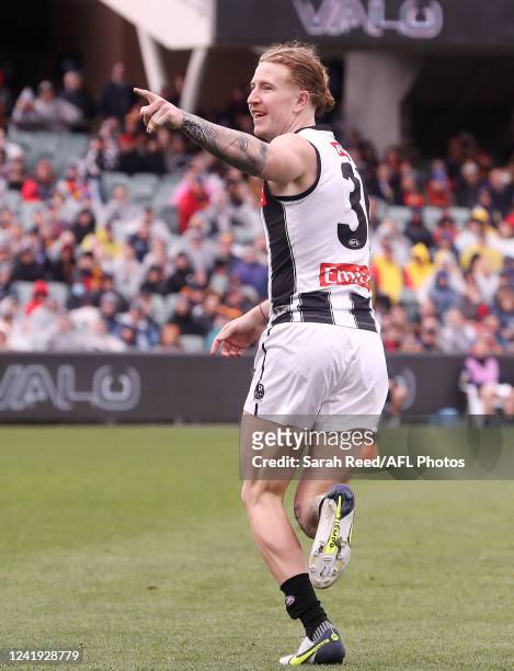 Beau McCreery of the Magpies celebrates a goal during the 2022 AFL Round 18 match between the Adelaide Crows and the Collingwood Magpies at the...